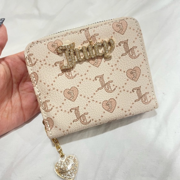 Juicy Couture Handbags - Juicy Couture Beige Wallet with Gold Accents